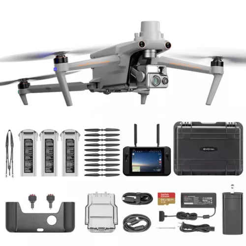 Drone kit with quadcopter drone, handheld controller screen, and accessory modules