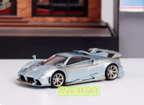1:64 alloy diecast sports car model, light blue and silver with front air intake