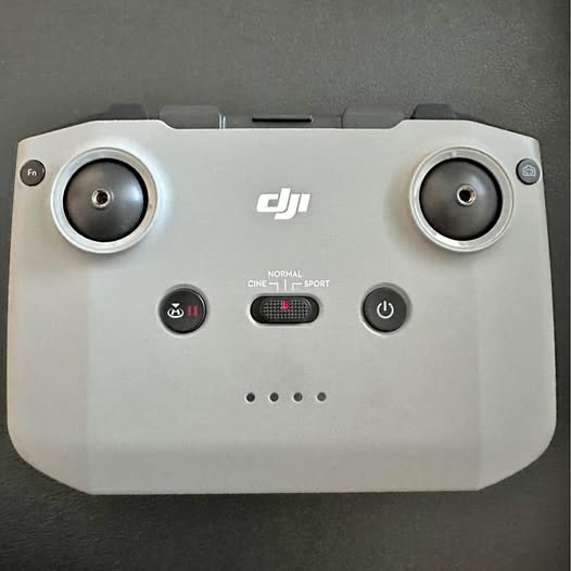 DJI Mini 3 remote controller with dual control sticks and button panel