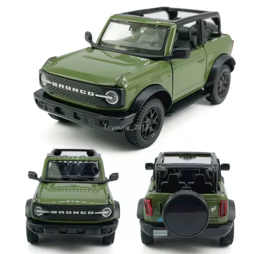 Green Ford Bronco diecast model car with black roof and grille, front 3/4 view