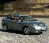 Diecast sedan car model, dark metallic gray-green, front 3/4 view