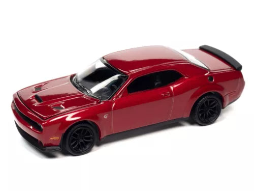 Red 1:64 scale diecast sports car with black hood and Z-style graphics