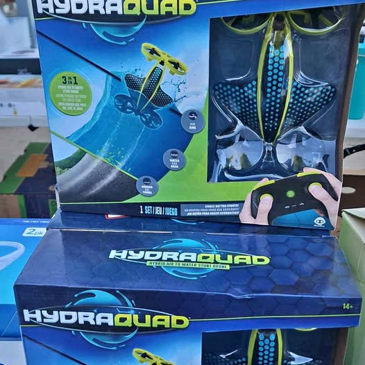 Hydraquad water drone toy in retail packaging, green and blue