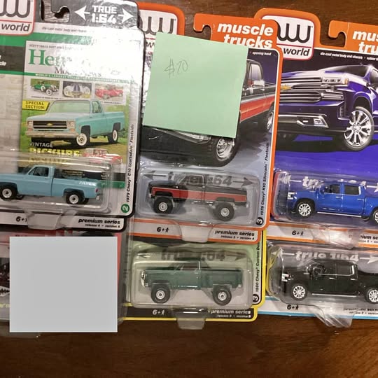 Assorted diecast pickup trucks in blister packs, front views, 6+ years