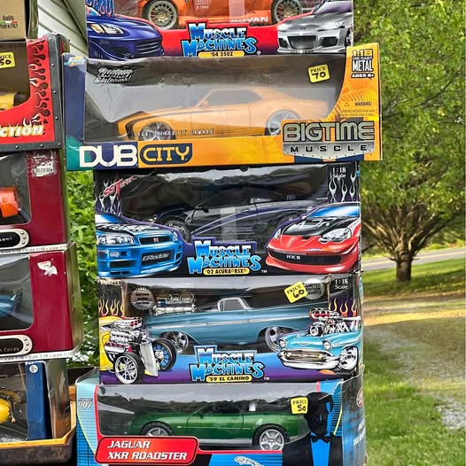 1:18 scale diecast car in retail box, colorful muscle car artwork and branding