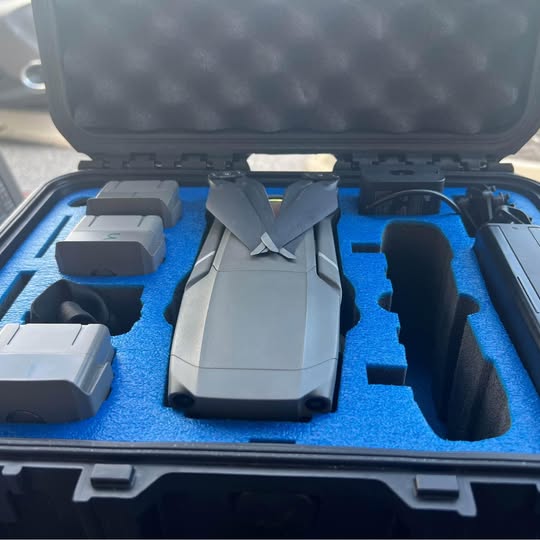Drone and controller kit in hard case with foam inserts