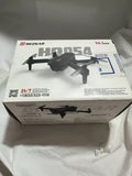 Mini foldable drone product box with black drone illustration and remote controller graphics