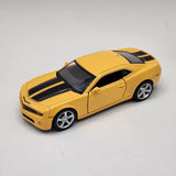 Yellow diecast toy car with black racing stripes, silver wheels, front view