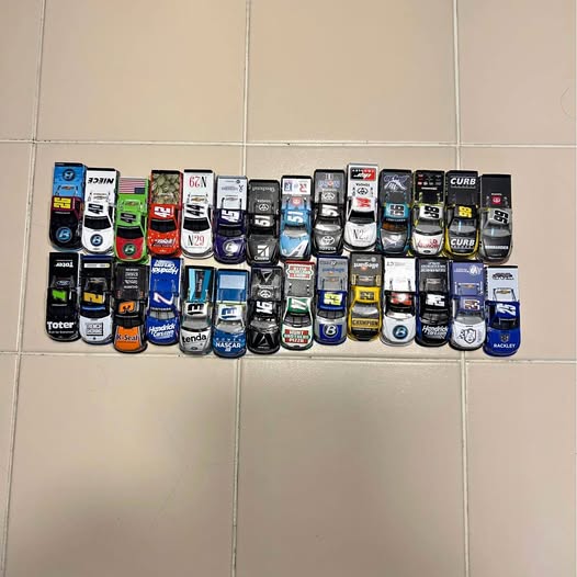 1/64 scale NASCAR diecast truck collection, assorted painted trucks with decals