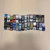 1/64 scale NASCAR diecast truck collection, assorted painted trucks with decals