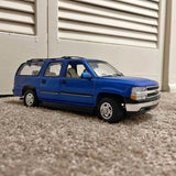 Chevrolet Suburban 1:18 diecast SUV model car, blue with chrome grille and wheels