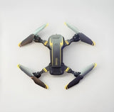 Black quadcopter drone with four propellers and central camera module