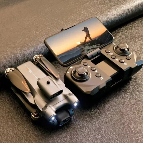 Quadcopter drone with remote controller and folding arms, camera module visible