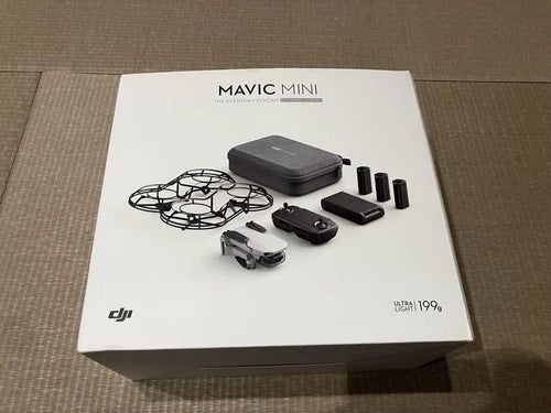 Mavic Mini drone accessory kit in box with drone, case, batteries, and propeller set