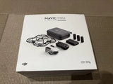 Mavic Mini drone accessory kit in box with drone, case, batteries, and propeller set
