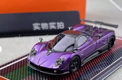 U2 purple sports diecast model car, front 3/4 view, detailed wheels