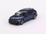 Blue diecast sports car model, front 3/4 view with detailed grille and headlights