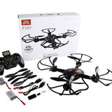 Quadcopter drone kit with black remote controller, propellers, and accessories on display