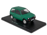Green diecast miniature car model on black display base, front three-quarter view