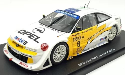 White and yellow Opel race car diecast model, front 3/4 view, detailed decals