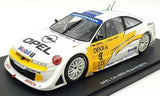 White and yellow Opel race car diecast model, front 3/4 view, detailed decals