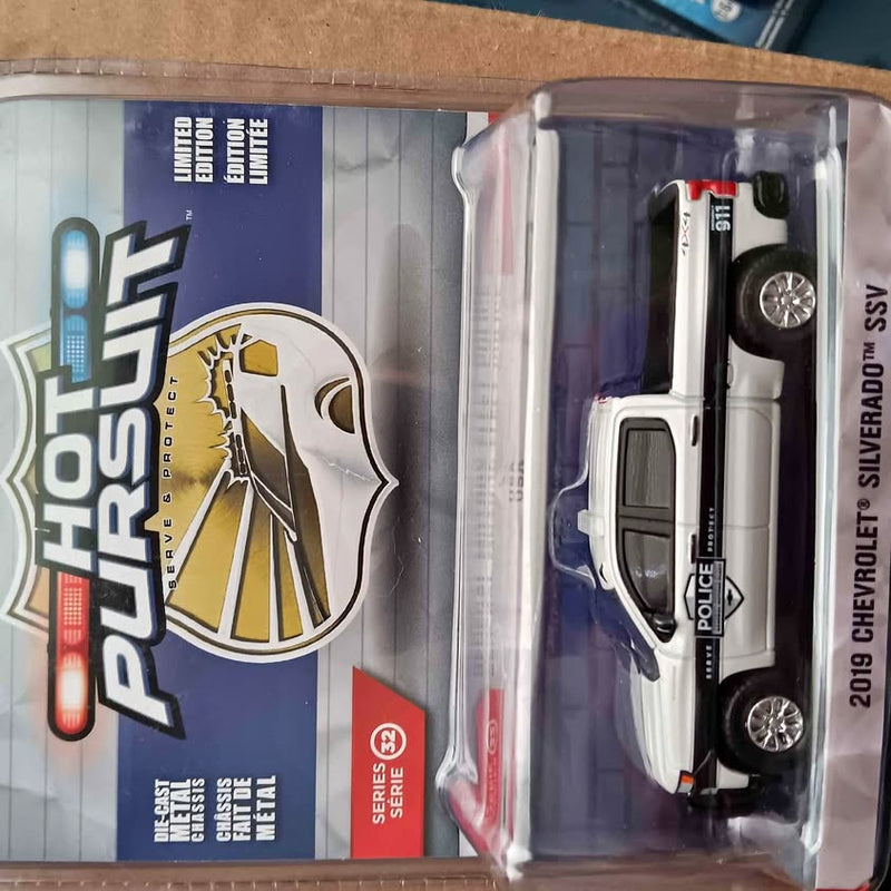 Diecast police pickup truck model in clear blister package