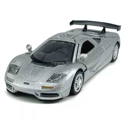 Silver 1:36 diecast model car with black windshield and front hood detail
