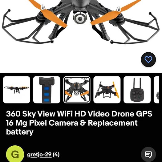 Drone: orange and black quadcopter with camera, folding arms, front view.