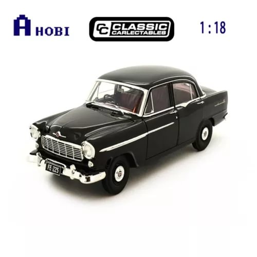 1:18 black diecast model car of a Holden FE Special, front three-quarter view