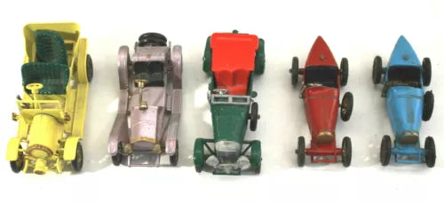 Vintage diecast model cars, yellow, silver, red, green, blue, in a row