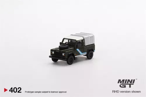 Diecast pickup model car in black with white roof, front 3/4 view