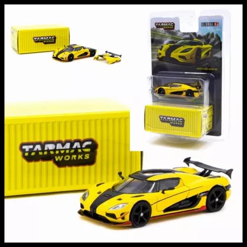 Yellow and black Koenigsegg Agera RS diecast car model with display box and blister