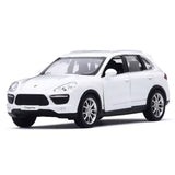 White 1:36 scale diecast model car of a Porsche Cayenne, front three-quarter view