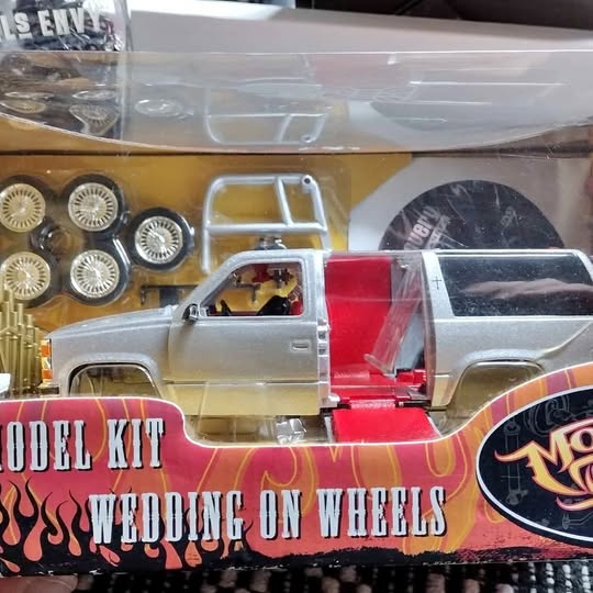 Monster Garage diecast model kit: silver truck cab with red door and open hood