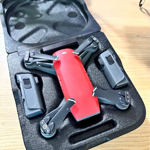 Red and black drone in a foam-lined hard case
