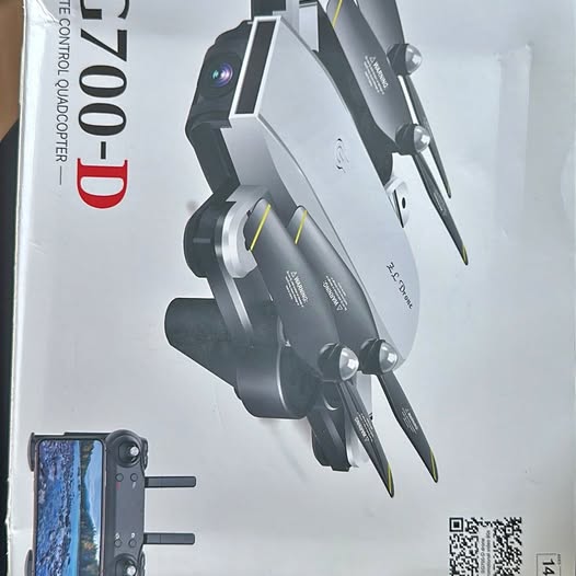 Adult camera drone with smartphone controller, black and gray quadcopter