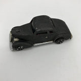 Dark gray diecast toy coupe car with black wheels