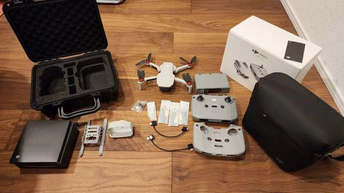 DJI Mini 2 Fly More Combo drone kit with controller, batteries, cases and bag