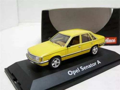 Yellow diecast model car of Opel Senator A, 4-door sedan with chrome wheels