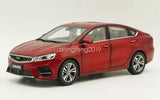 Red 1/18 scale diecast sedan car model, front three-quarter view, chrome wheels