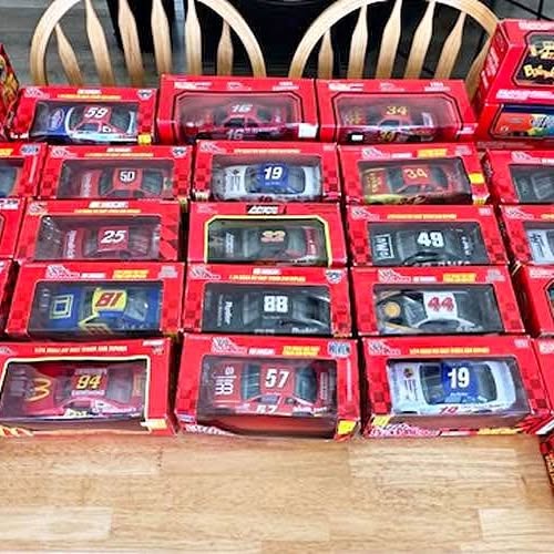 Red NASCAR diecast car lot in retail boxes, multiple cars