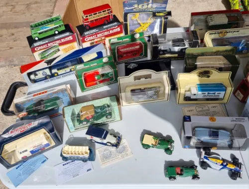 Assorted 1:43 diecast model cars, boxed and loose vehicles
