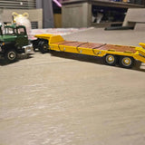 Diecast Mack Mansfield MA truck, yellow cab and flatbed with detailed wheels