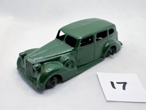 Dark green vintage diecast touring saloon car model with open hood detail