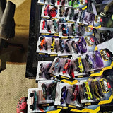 Diecast toy car blister pack assortment in various colors, displayed on cards