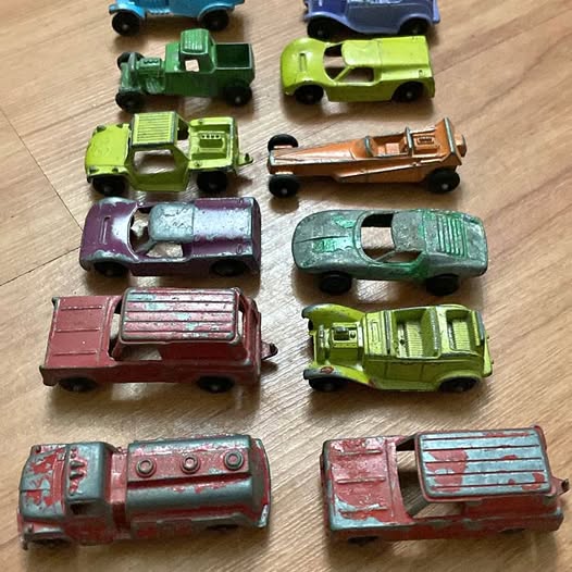 Small diecast car lot of assorted colorful toy cars in top view