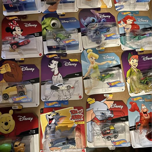 Disney Hot Wheels 1/64 diecast cars in blister packaging, assorted character themes