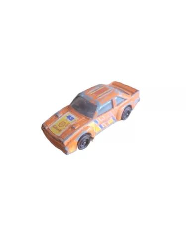Orange die-cast race car with decals, front three-quarter view