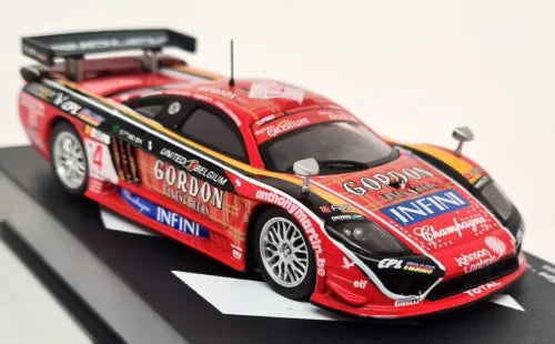 Red and black race car diecast model with number 4 and sponsor decals