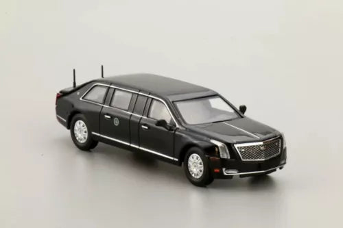 Diecast metal limousine toy car, dark glossy finish, chrome grille and headlights